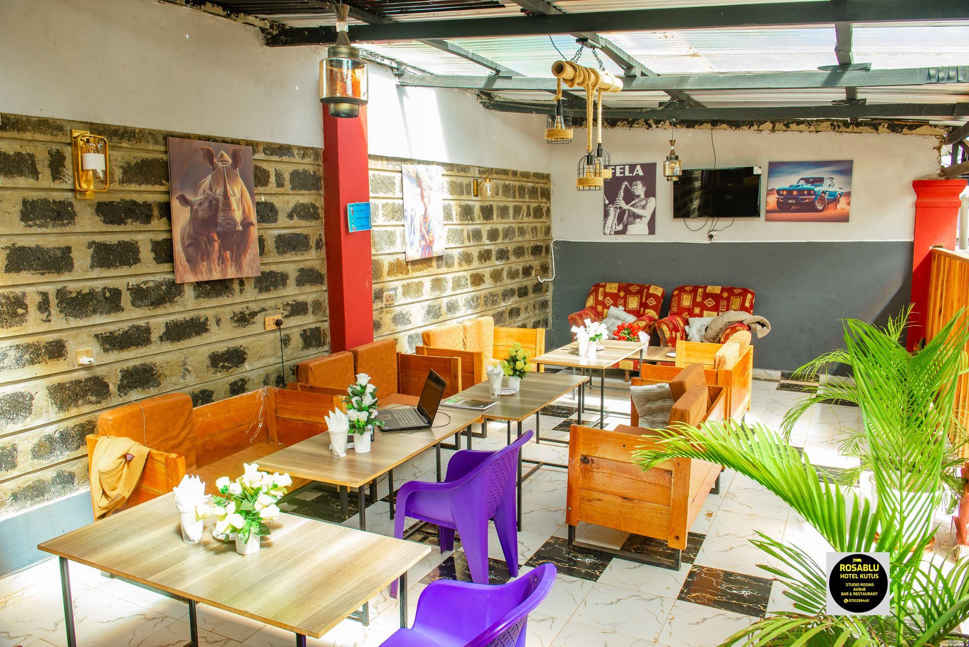 Photo shows part of the restaurant at RosaBlu Hotel Kutus