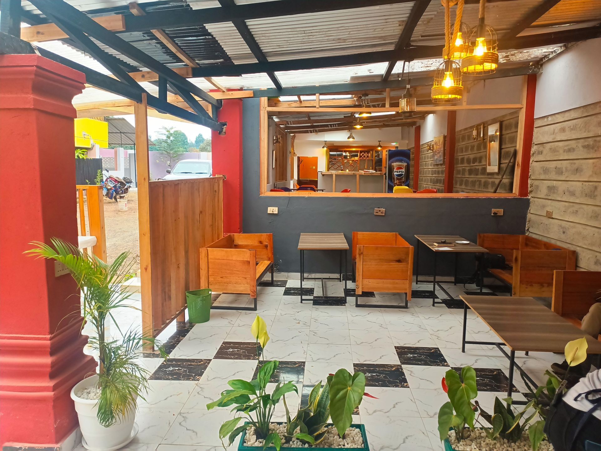The image shows inside RosaBlu Hotel Restaurant which can also be converted into a conference room