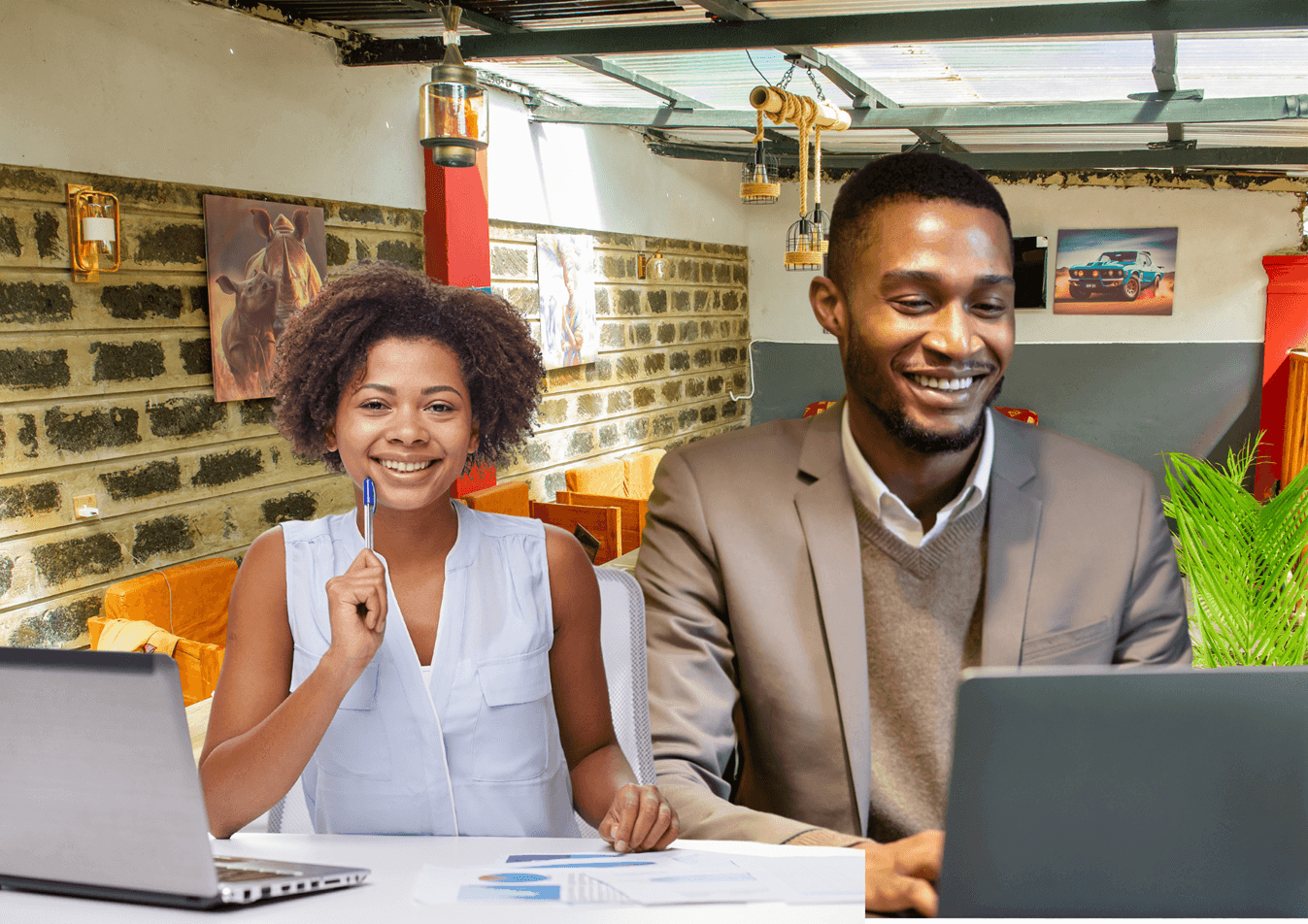 Image of business travellers working from RosaBlu Hotel Kutus Restaurant using satellite Wifi